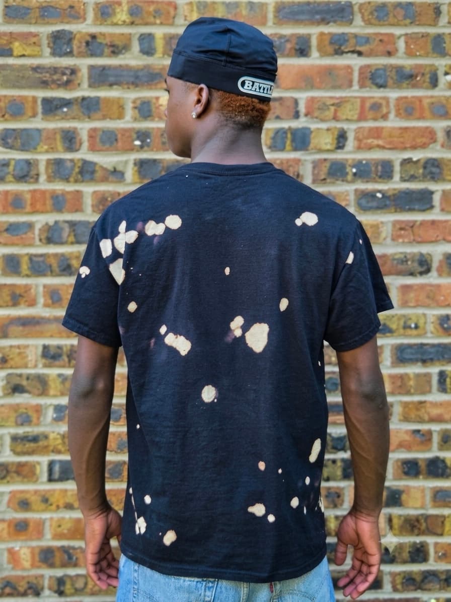 Design 14 — hand-sprayed tee, back