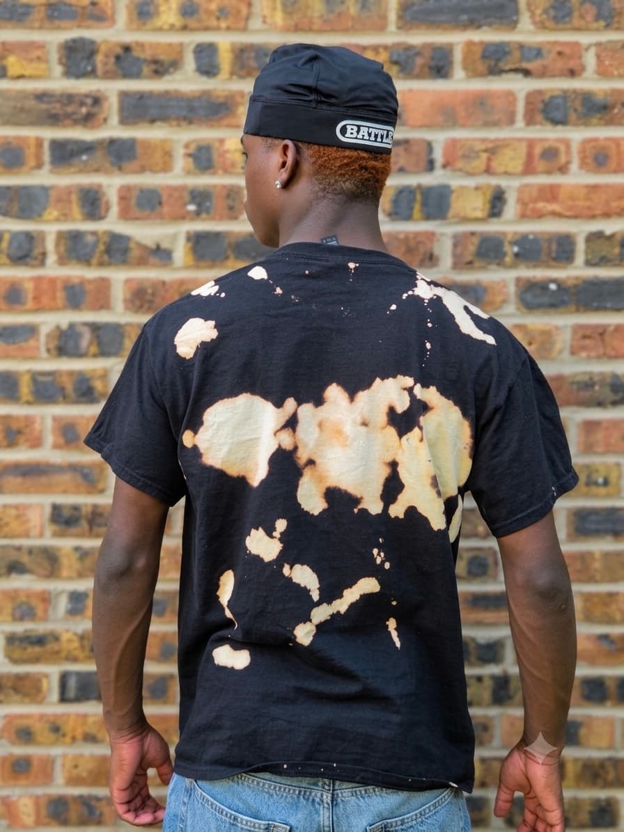 Design 15 — hand-sprayed tee, back