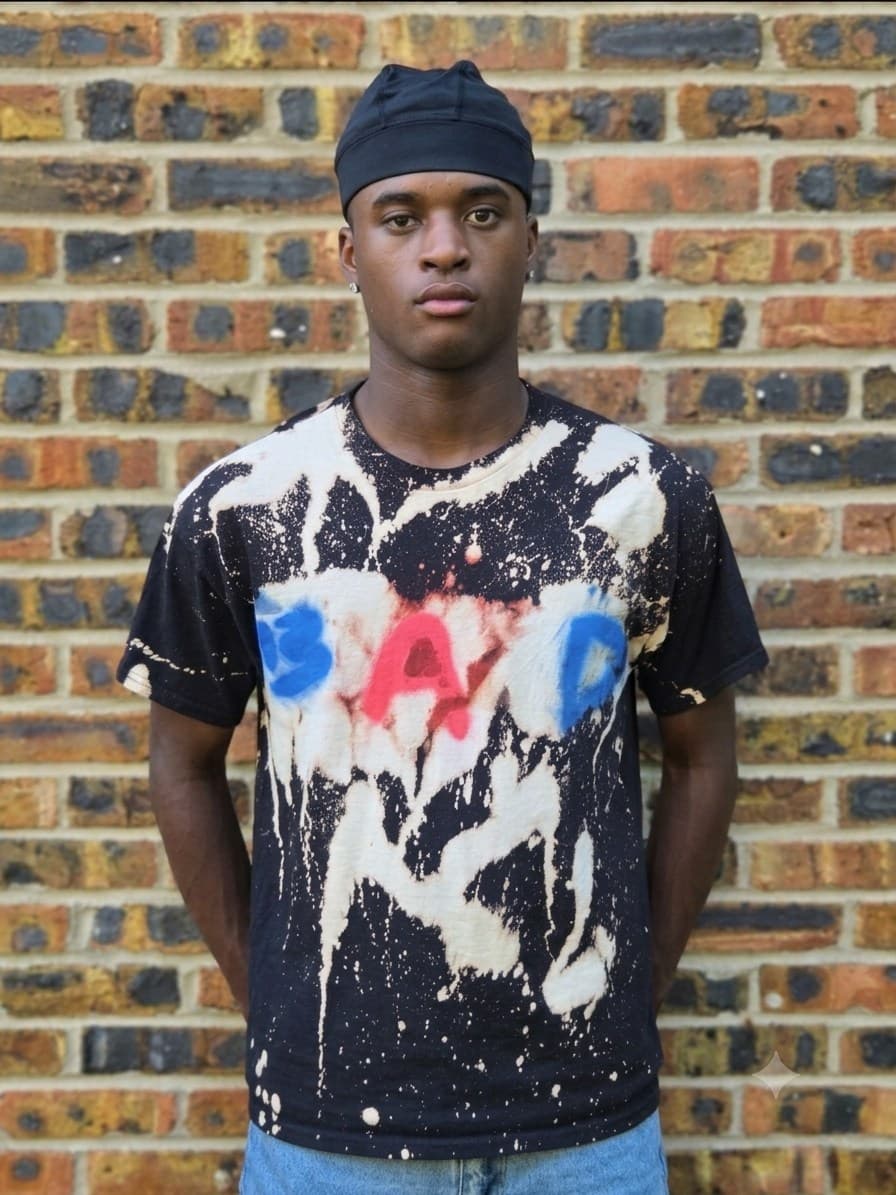 Design 15 — hand-sprayed tee, front